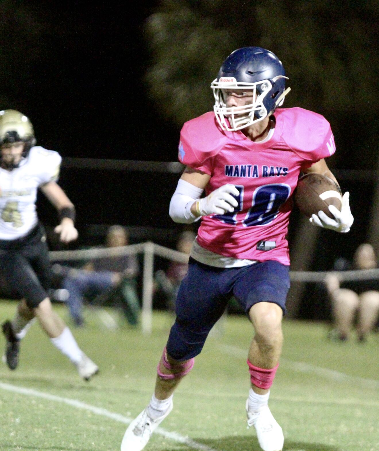 MIA Falls 4. Senior Luke McLain heads for the open field..jpeg